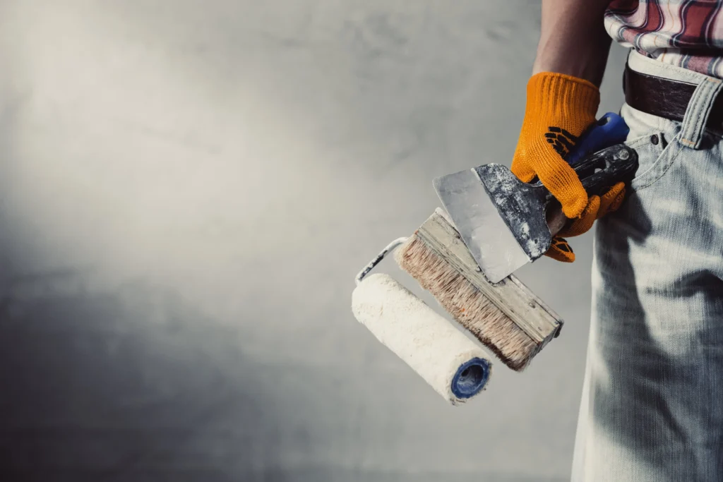 Current image: drywall contractor applying knockdown texture on walls in Edmonton home