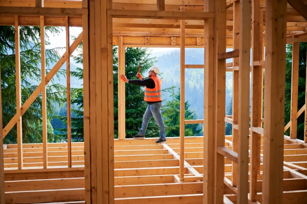 Contractor coordinating framing drywall and finishing work on an Edmonton renovation
